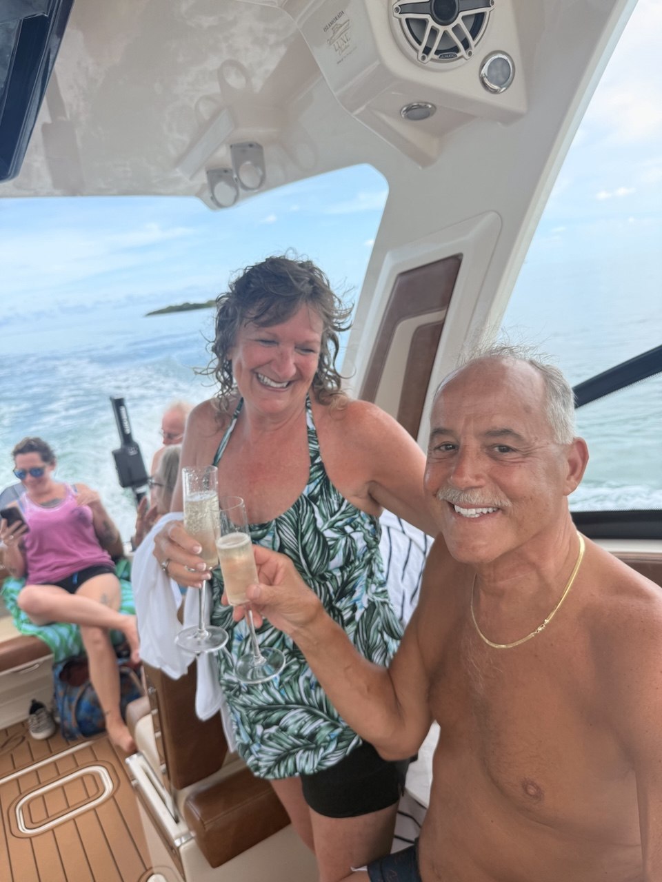 Guest enjoying champagne service during a private charter