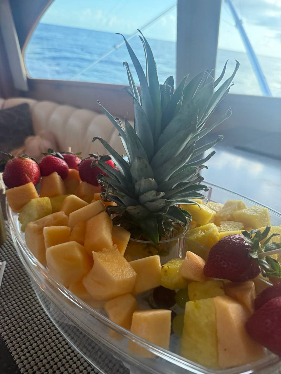 Fresh fruit and hospitality setup for offshore fishing charter guests
