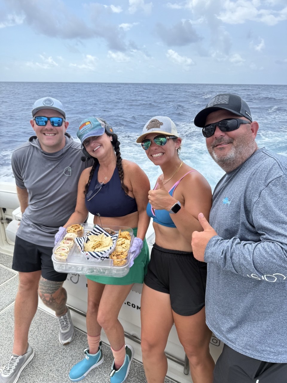 Guests enjoying luxury hospitality during an offshore charter in Islamorada