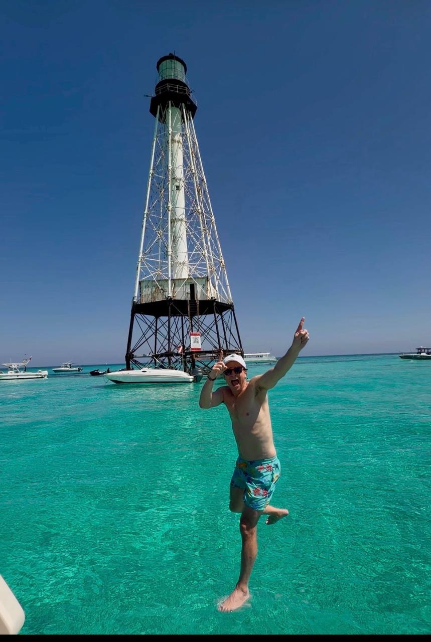 Guests swimming near Alligator Reef Lighthouse in Islamorada