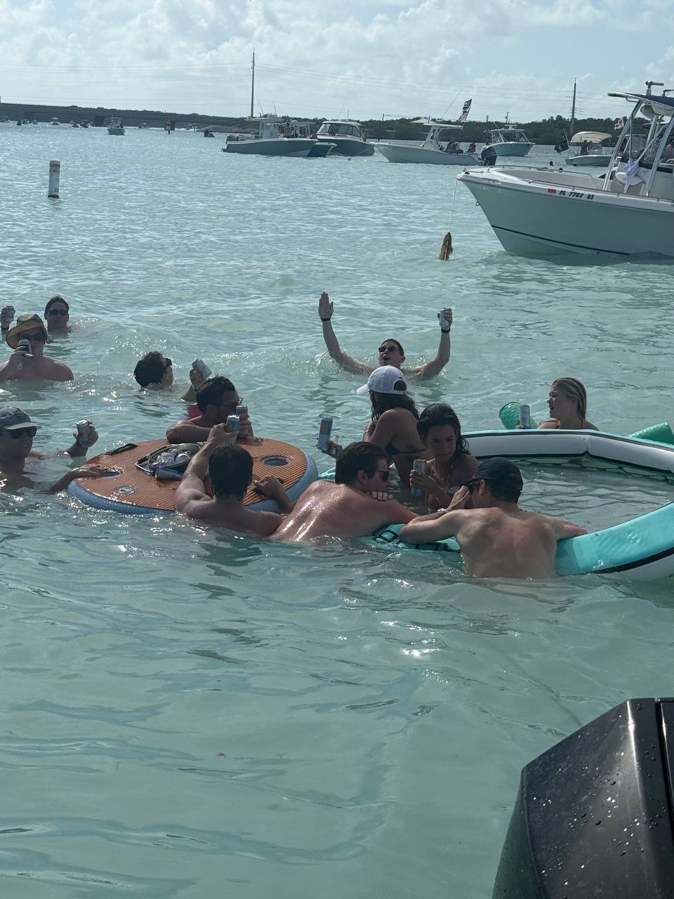 Guests floating together at the Islamorada sandbar